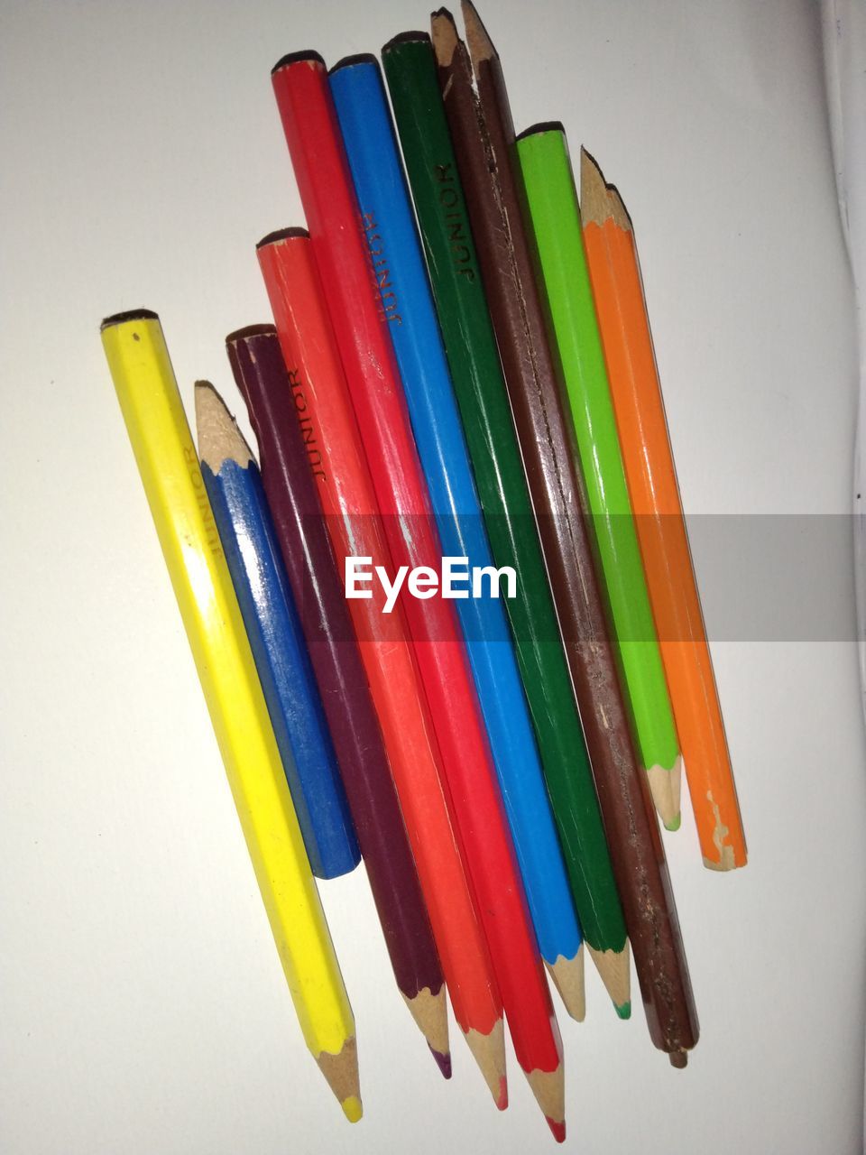 multi colored, pencil, variation, indoors, writing instrument, colored pencil, still life, no people, large group of objects, group of objects, creativity, close-up, education, craft, arrangement, vibrant color, studio shot, order, in a row, pen, high angle view