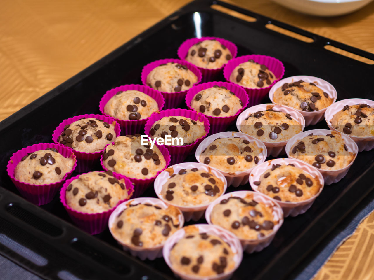 food and drink, food, baked, dessert, freshness, no people, meal, sweetness, tray, dish, cuisine, sweet food, indoors, high angle view, cake, sweet, still life, large group of objects, fast food, asian food, in a row, muffin, snack