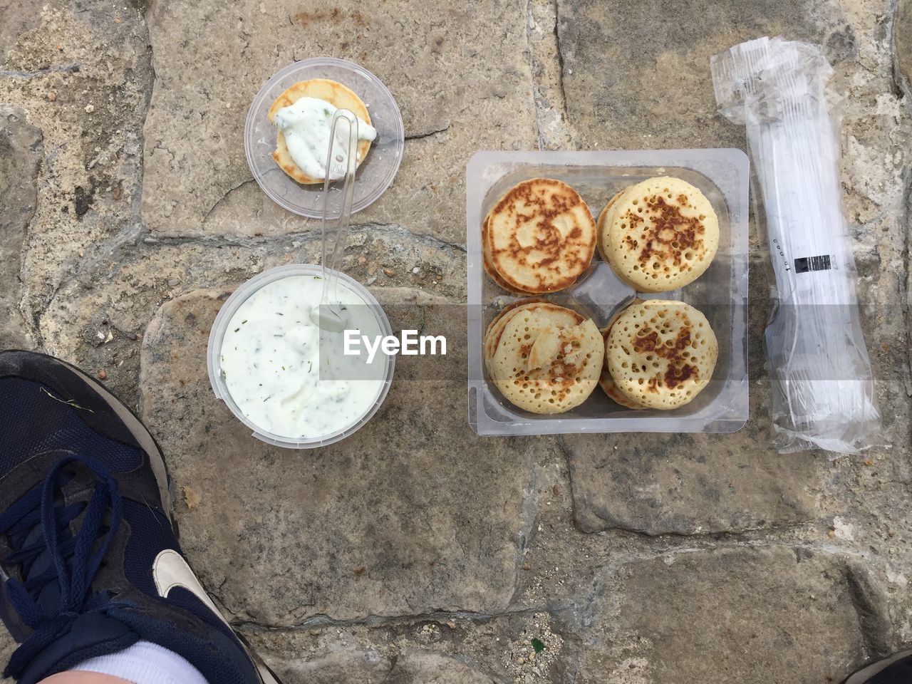 High angle view of breakfast on footpath