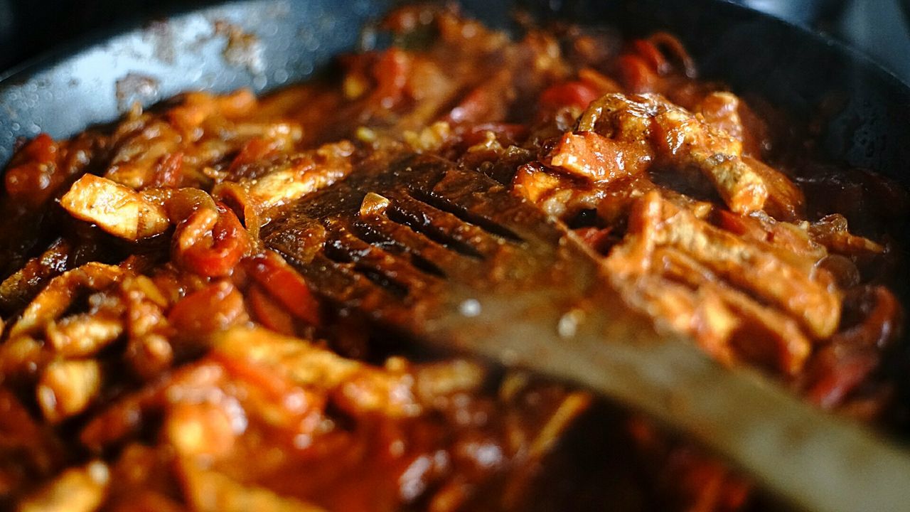 Close-up of food being cooked in pan