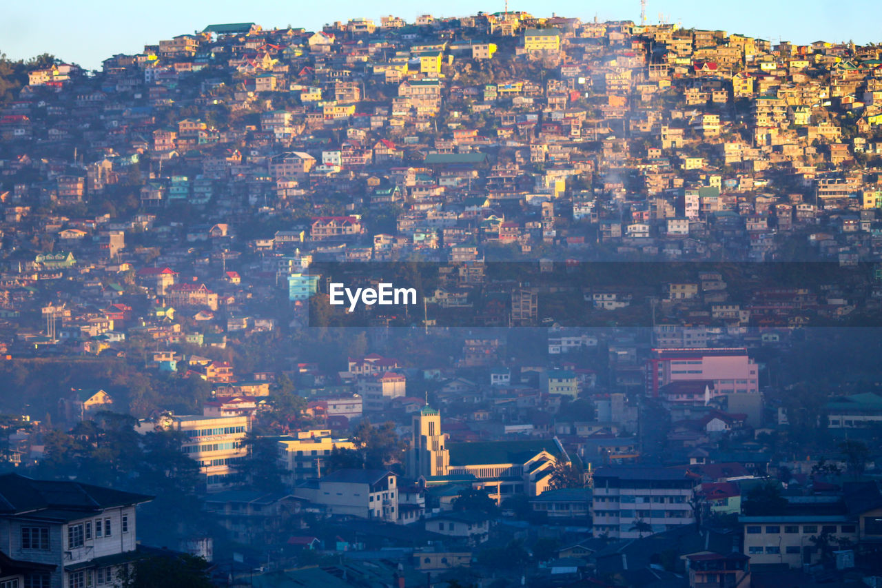 Aerial view of cityscape located on a mountain 