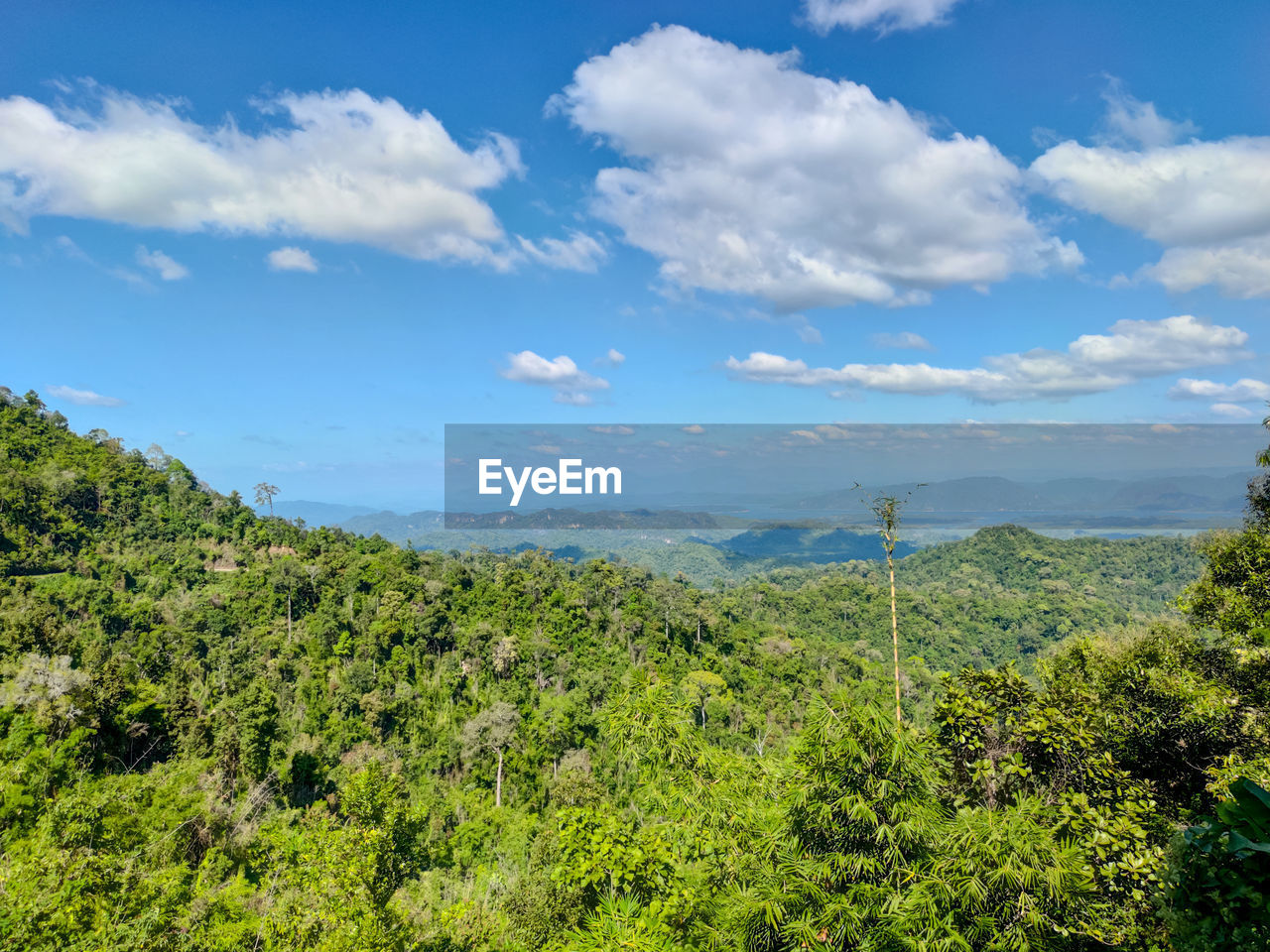 SCENIC VIEW OF LANDSCAPE AND MOUNTAINS AGAINST SKY