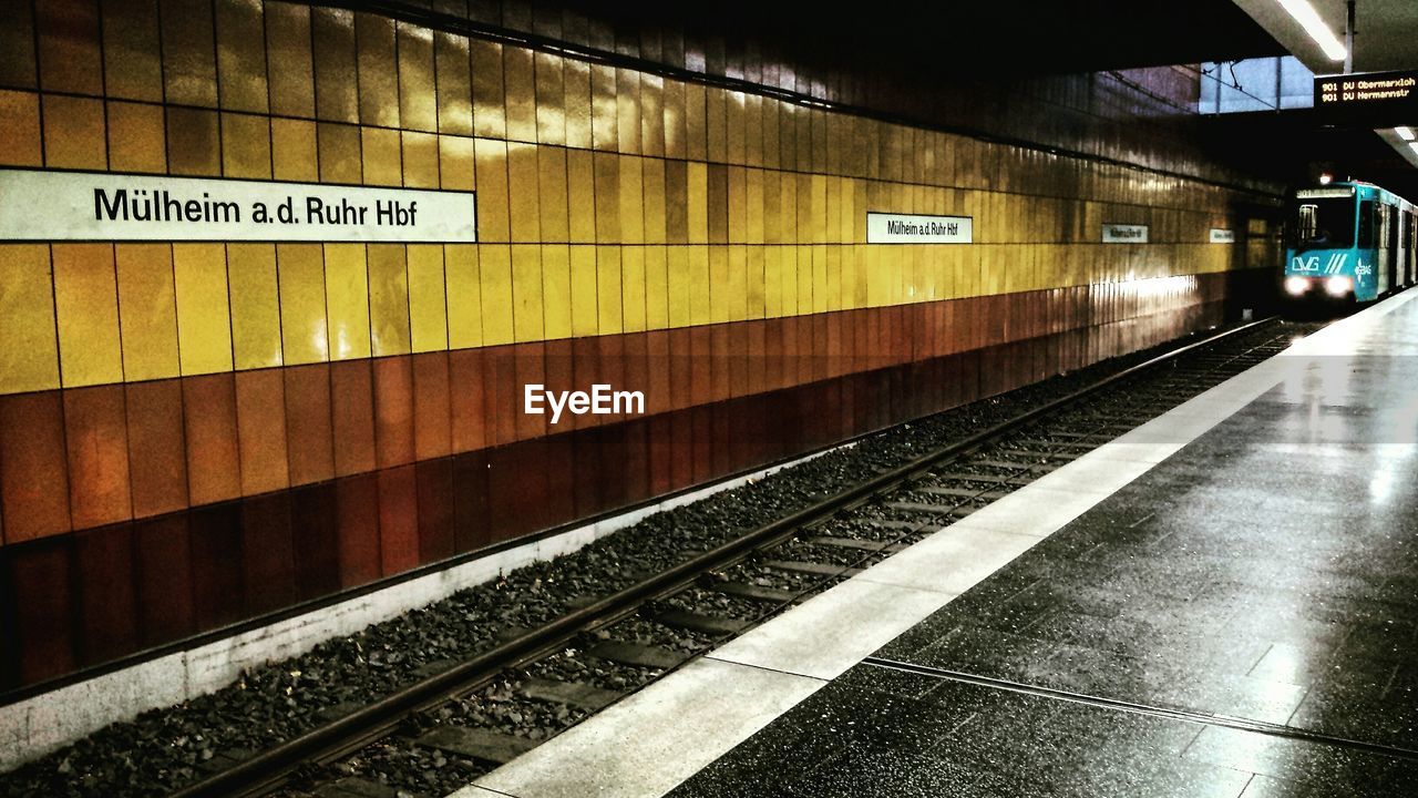 Subway train arriving at station