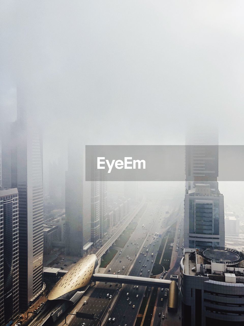 Aerial view of cityscape in foggy weather