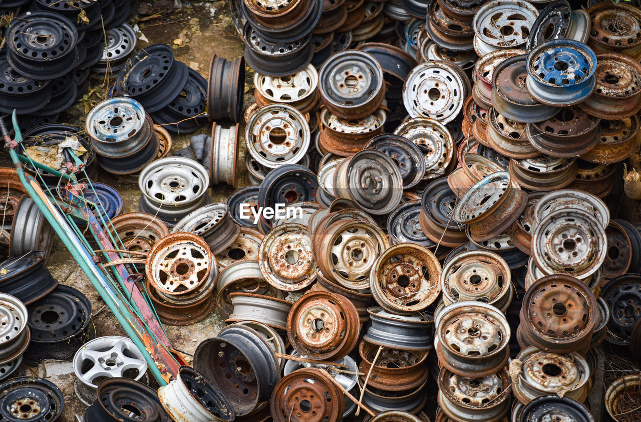 FULL FRAME SHOT OF STACK OF METALLIC OBJECTS