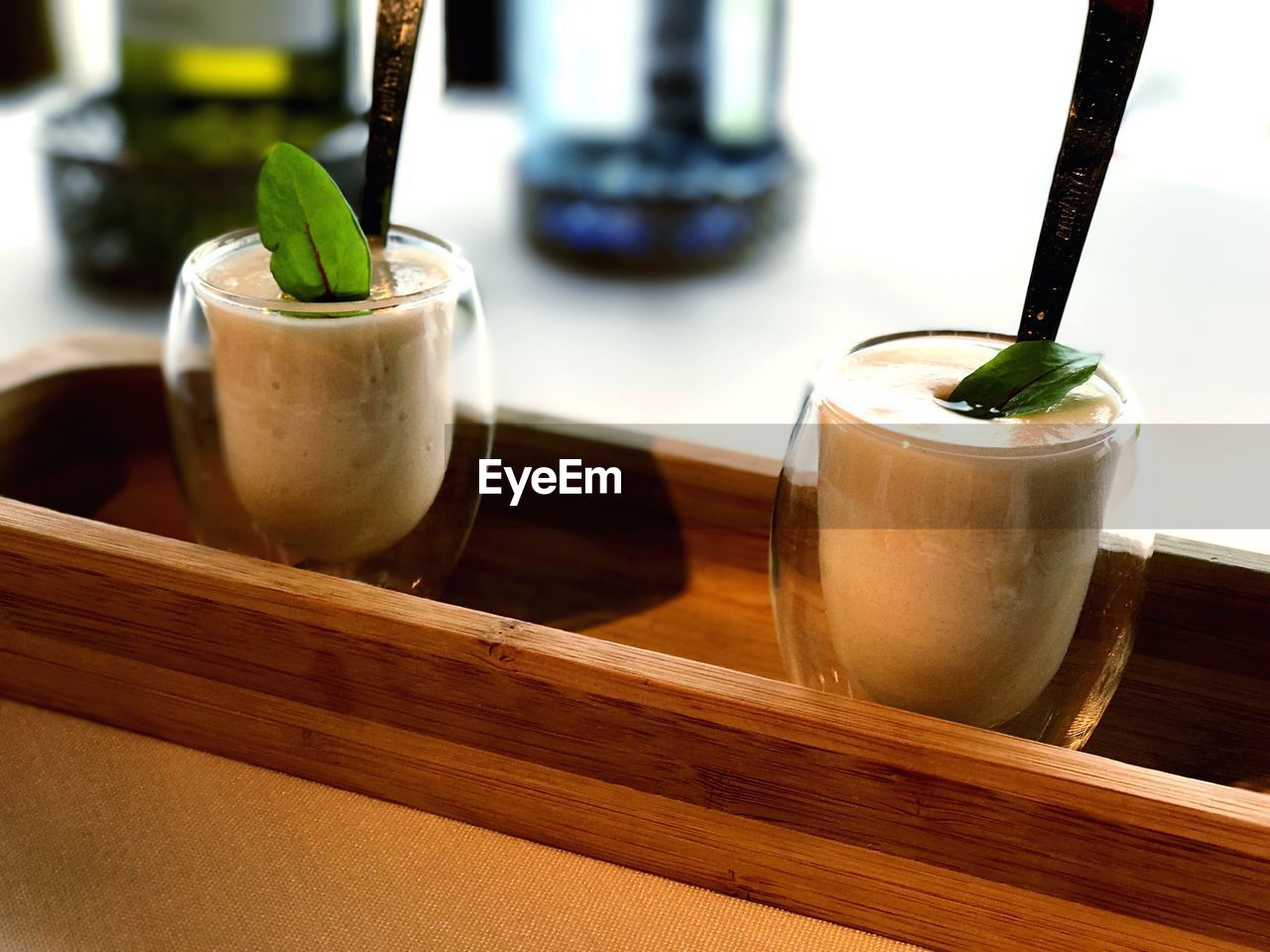 CLOSE-UP OF DRINK WITH GLASS OF TABLE
