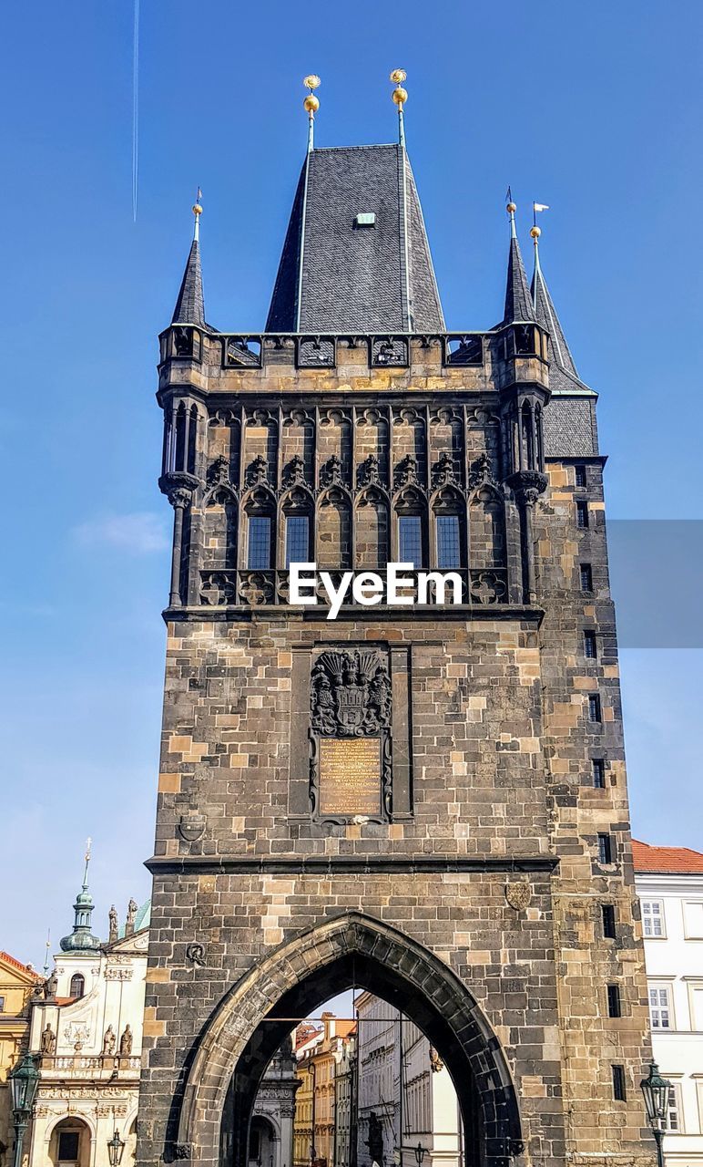 Low angle view of historical building against blue sky