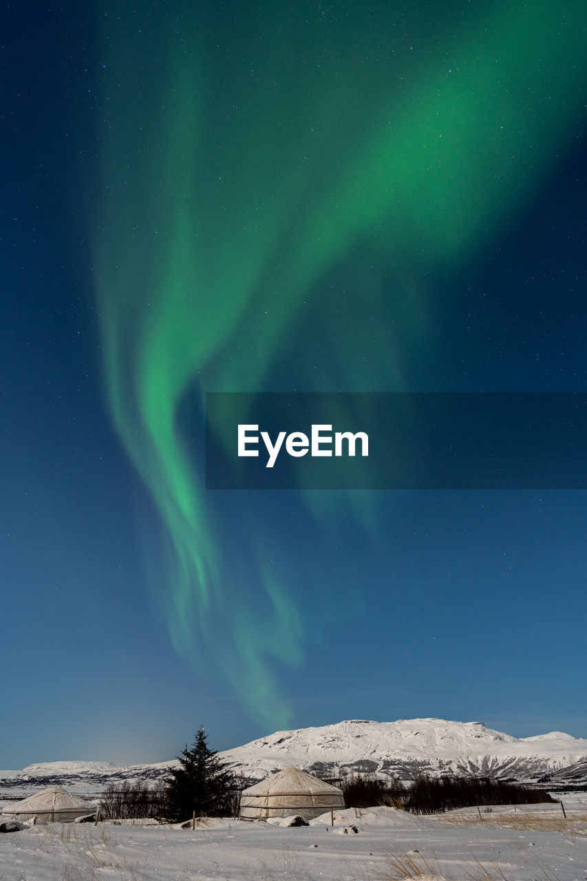 Aurora over a mongolian yurt in iceland
