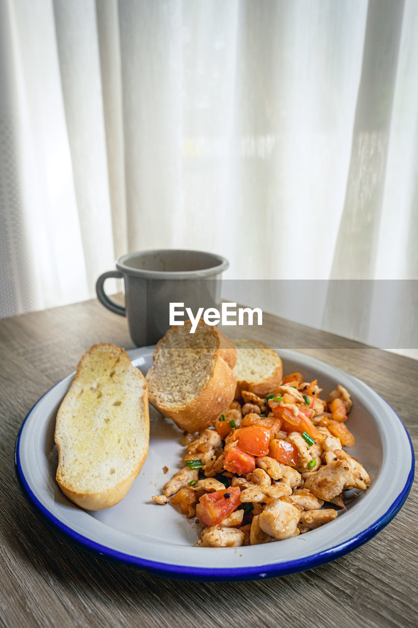 Close-up of breakfast served on table