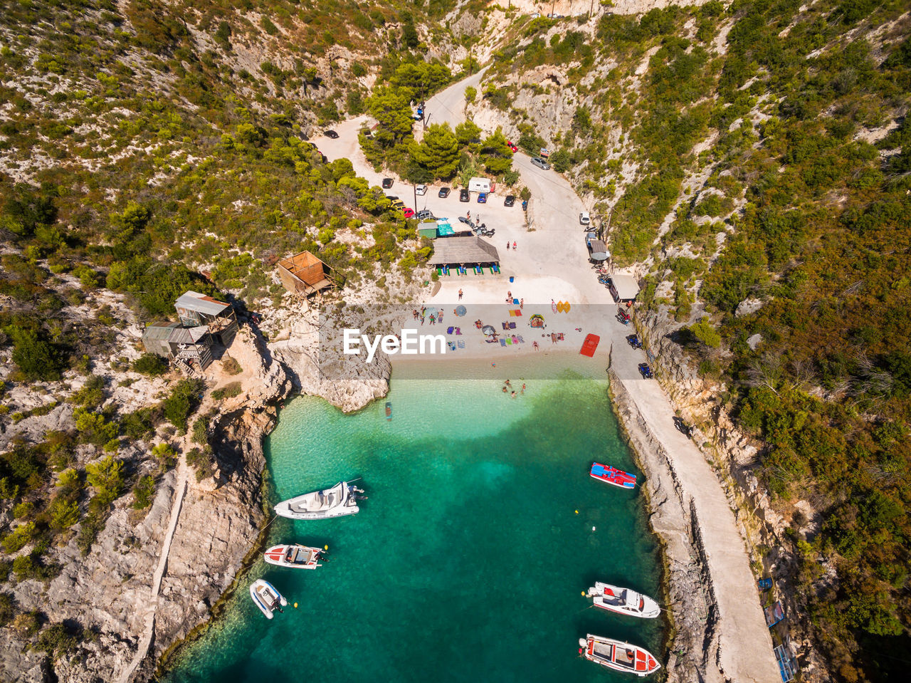 Aerial view of sea and landscape against sky