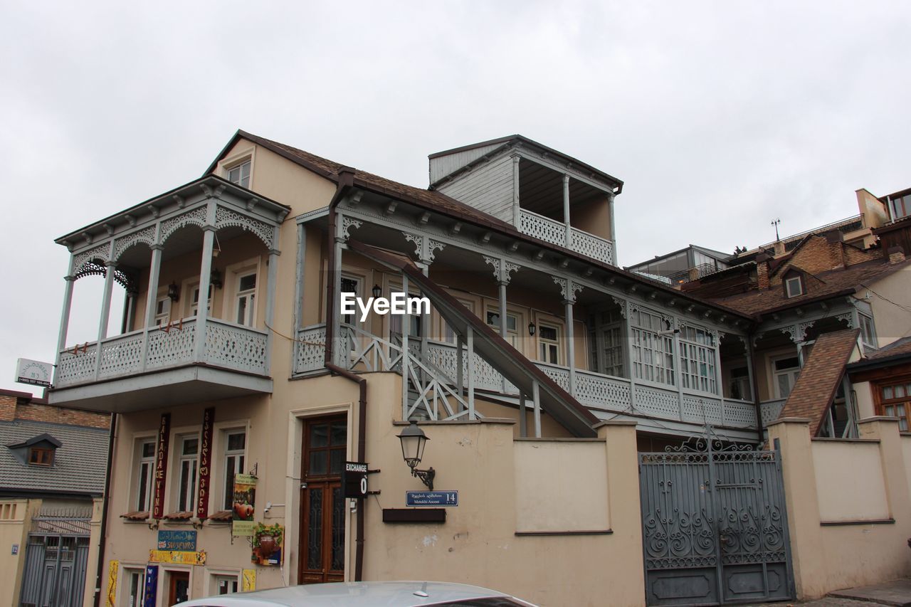 LOW ANGLE VIEW OF BUILDINGS IN TOWN