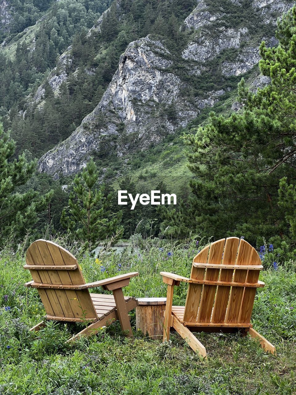 Wooden chairs with the mountain view 