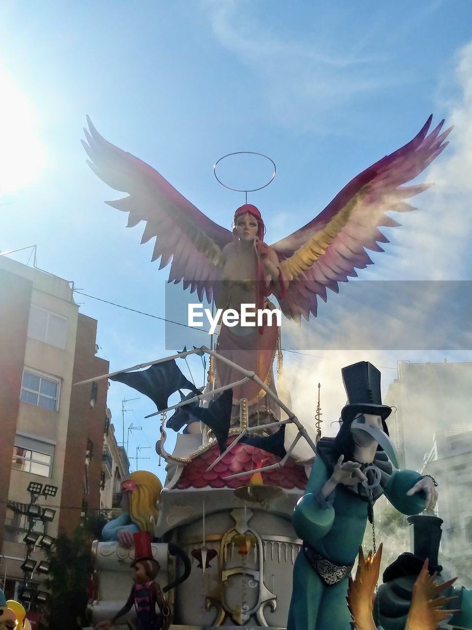 LOW ANGLE VIEW OF STATUE OF BIRD FLYING AGAINST SKY