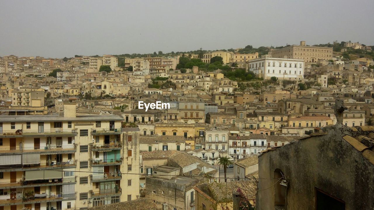 Cityscape against clear sky