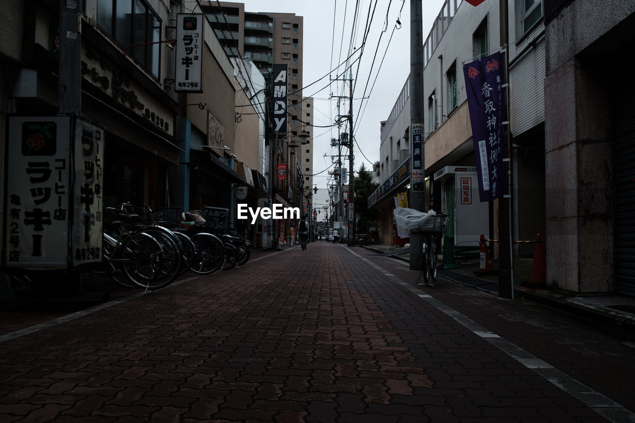 STREET IN CITY AGAINST SKY