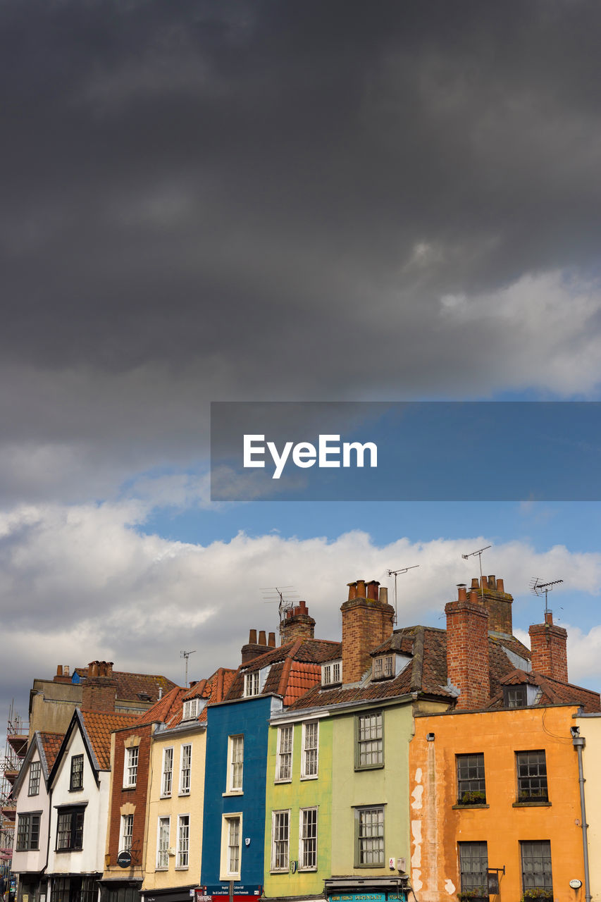 LOW ANGLE VIEW OF BUILDINGS IN TOWN