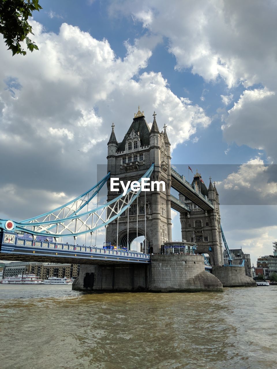 VIEW OF BRIDGE OVER RIVER IN CITY