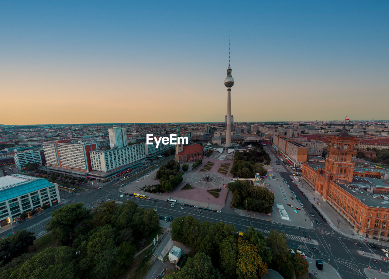 high angle view of cityscape against sky during sunset