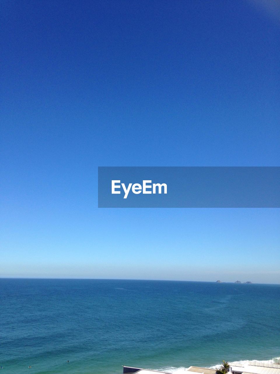 SCENIC VIEW OF SEA AGAINST BLUE SKY