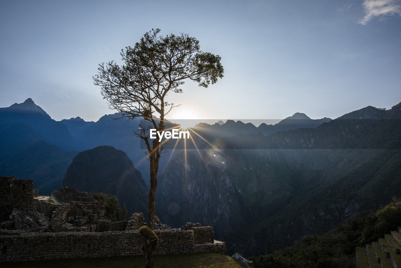 panoramic view of mountain range against sky