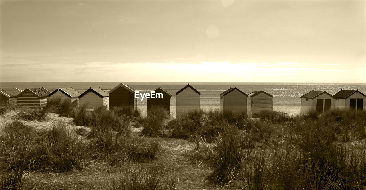 VIEW OF BEACH HUT AGAINST SKY