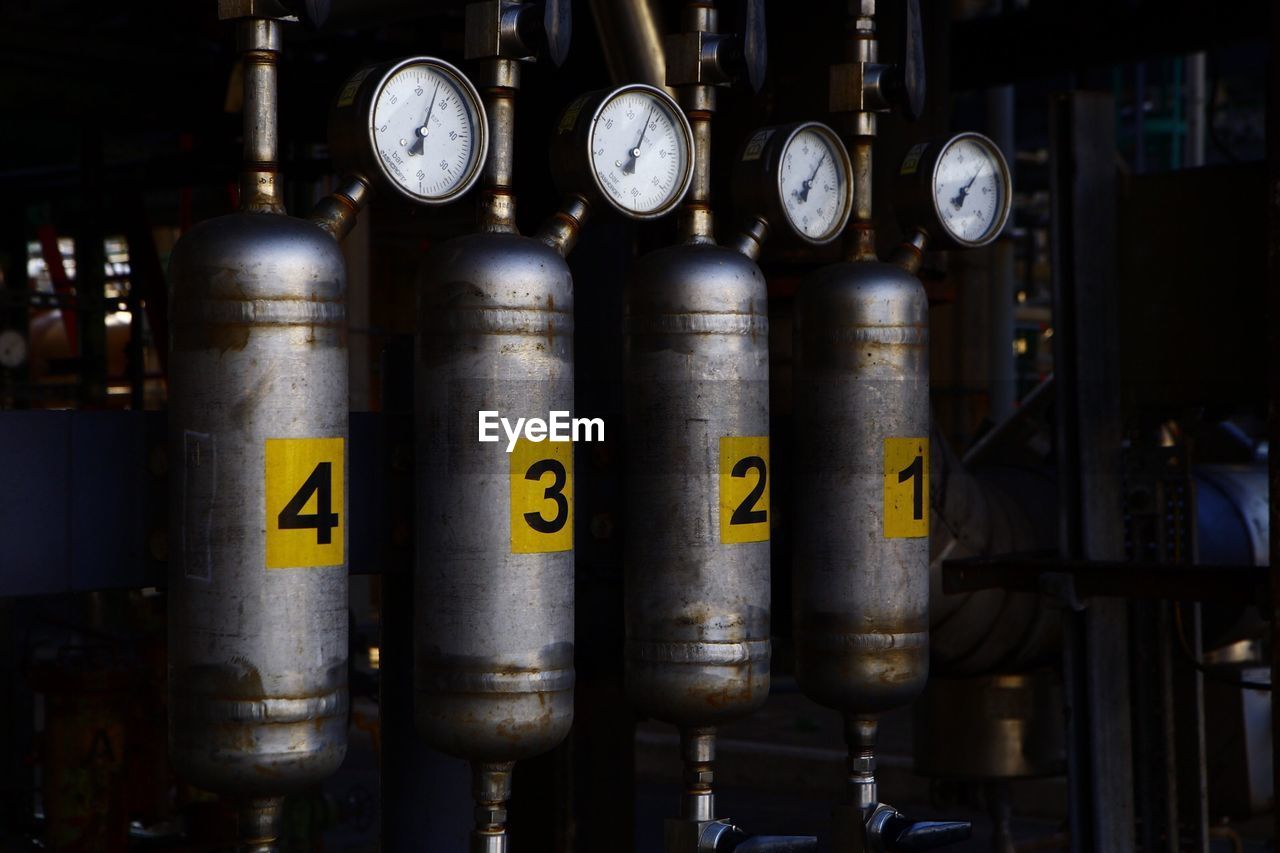 Close-up of cylinders in factory