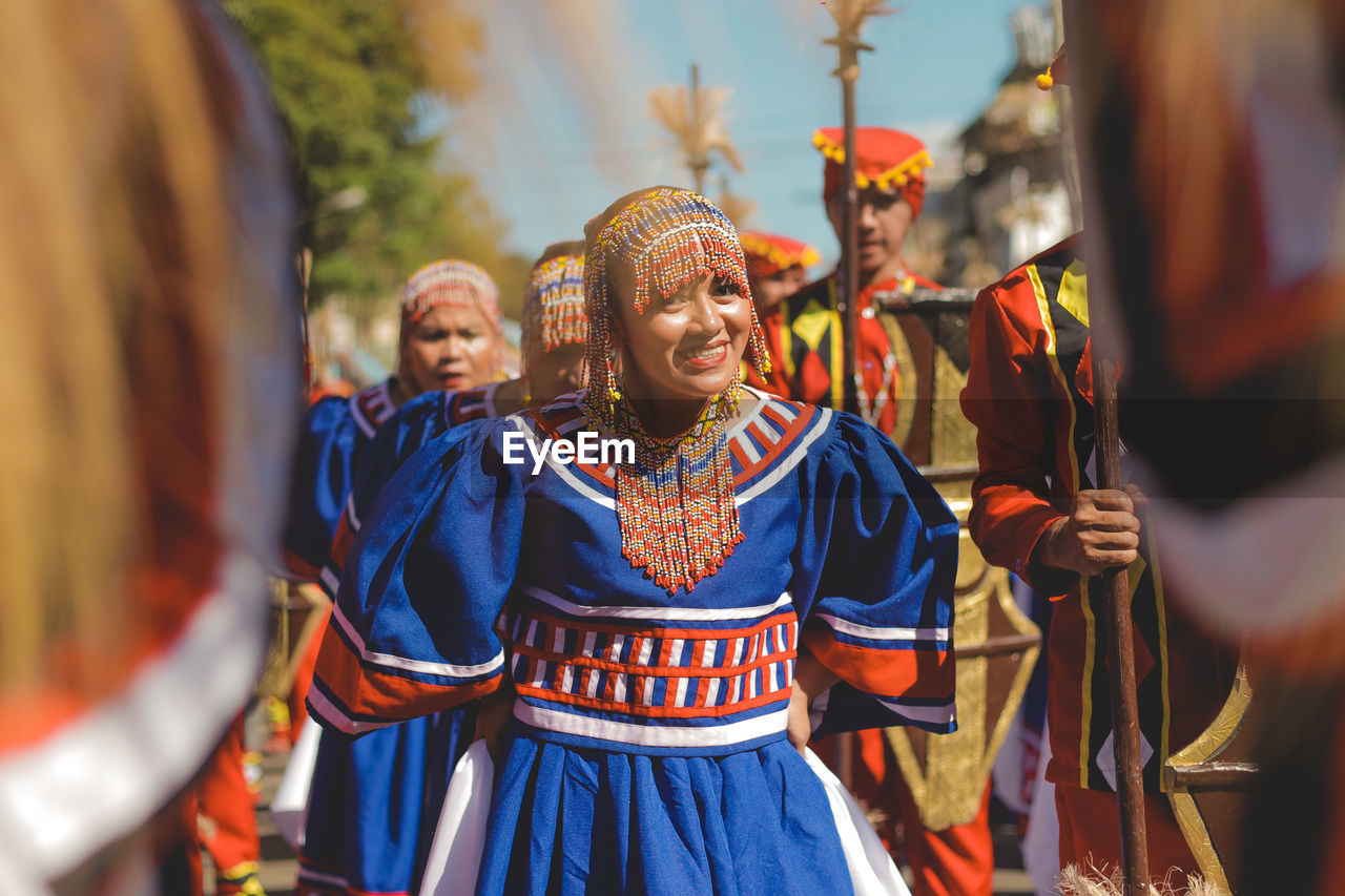 GROUP OF PEOPLE IN TRADITIONAL DRESS