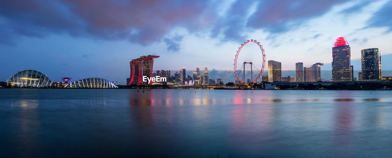 Pano of Marina Bay Travel Destinations Financial District  Modern Office Building Exterior Cityscape Ferris Wheel Urban Skyline Water City Waterfront Reflection Building Exterior Building Built Structure Architecture Sky Arts Culture And Entertainment