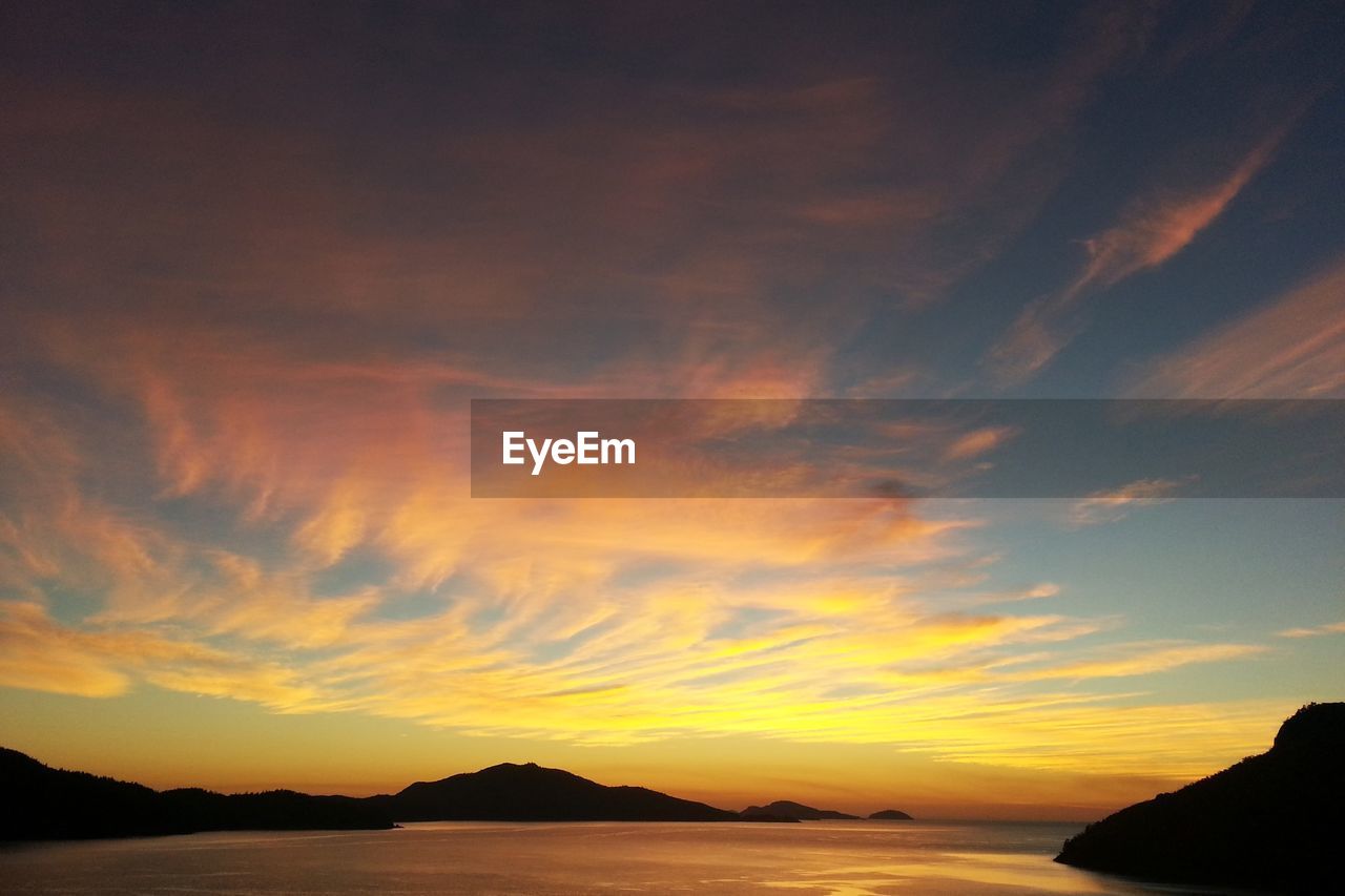 Scenic view of sea against sky during sunset