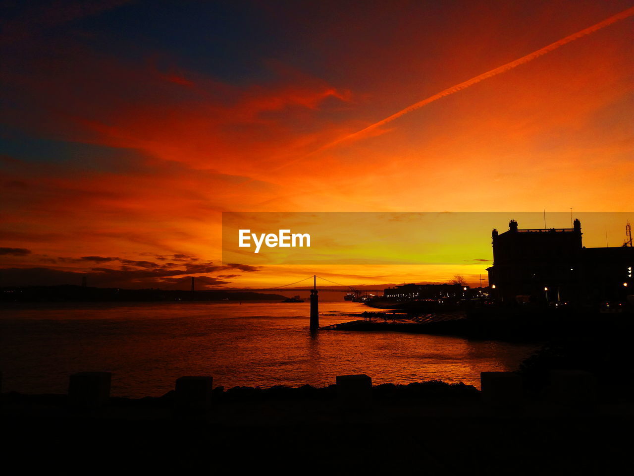 Silhouette of buildings at sunset