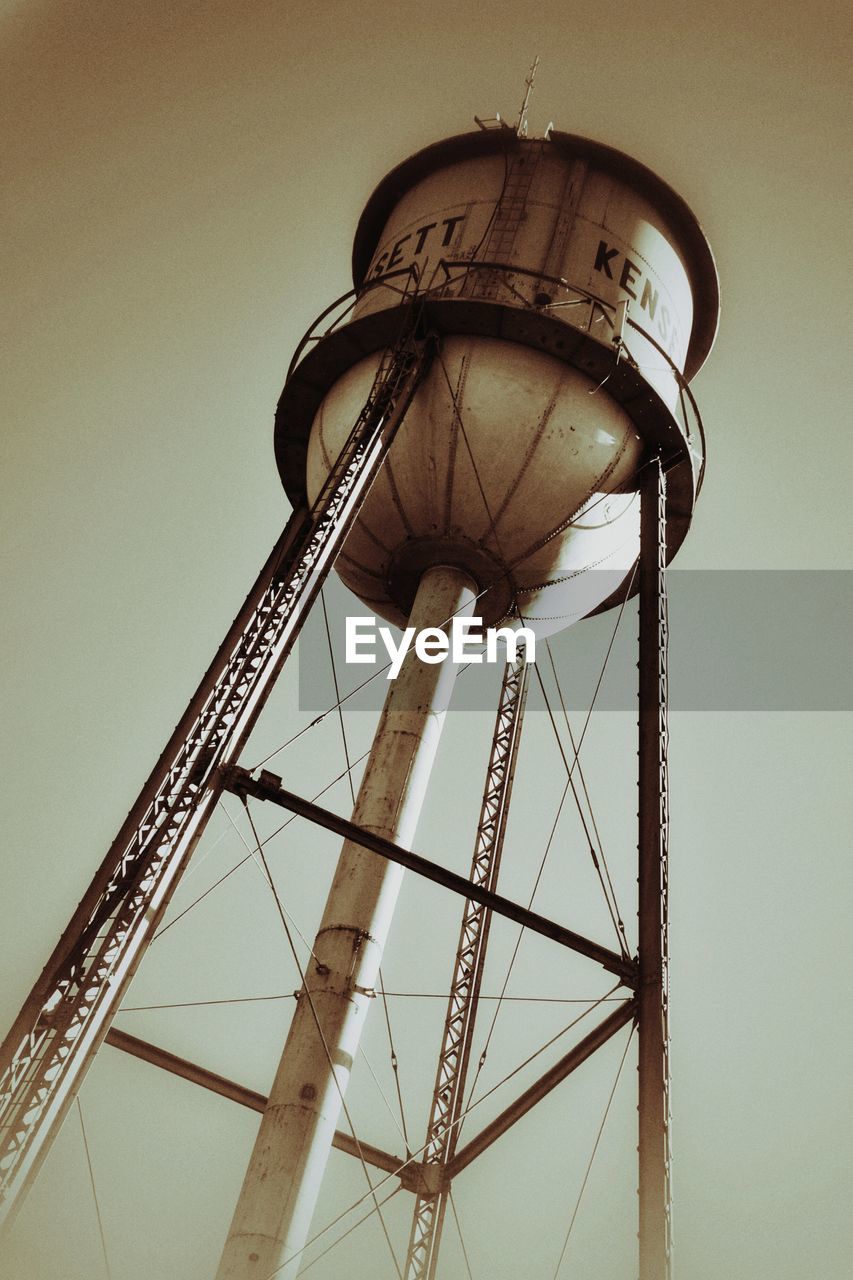 Low angle view of water tower against clear sky