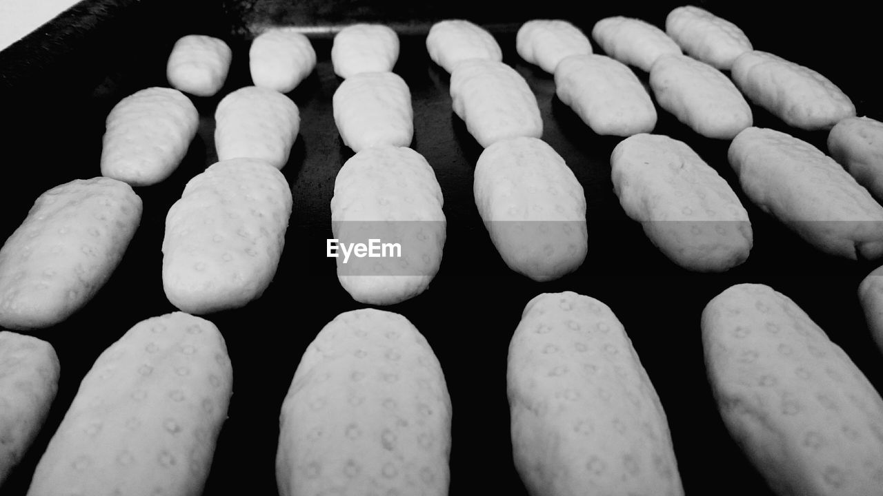 Full frame of baked cookies in tray