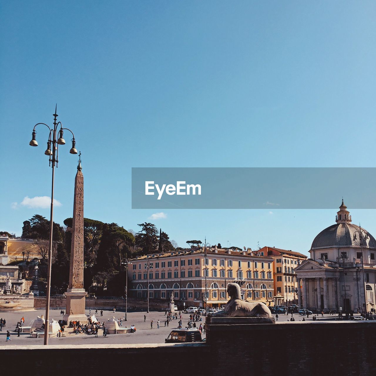 Piazza del popolo against blue sky on sunny day