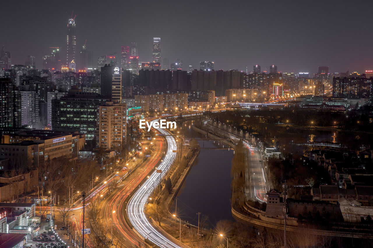 High angle view of illuminated cityscape at night