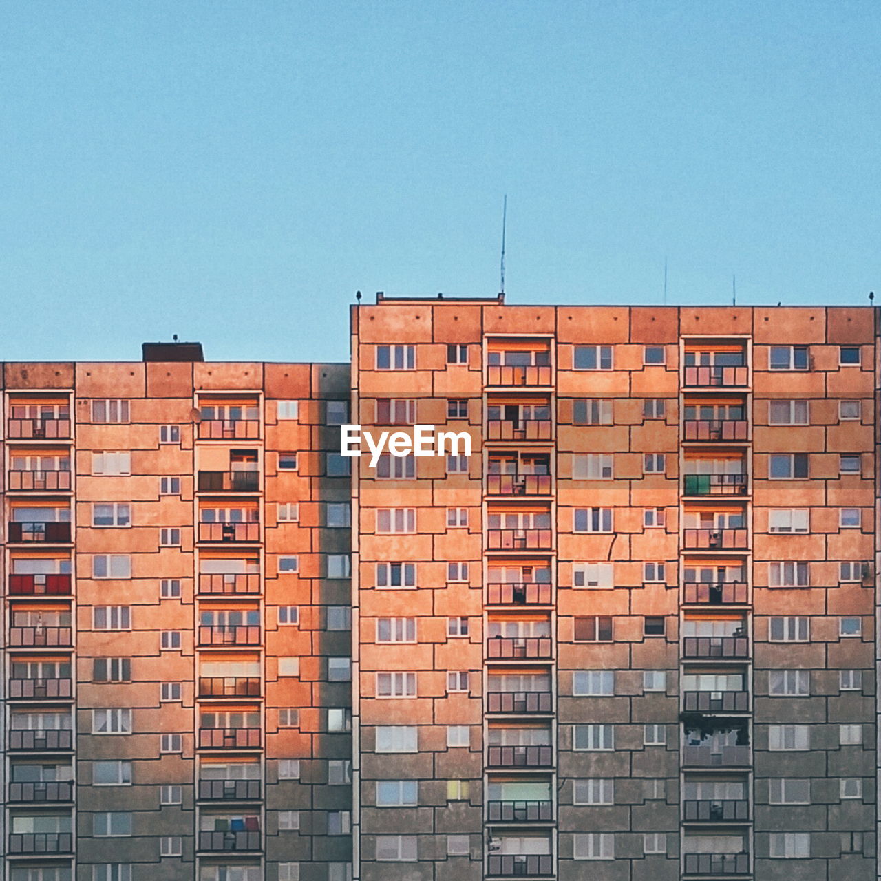 High angle view of buildings against clear sky