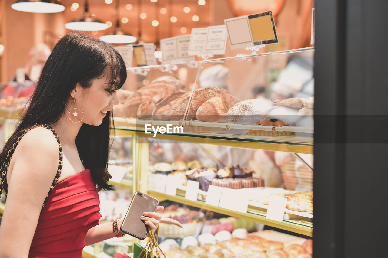 Young woman shopping in mall