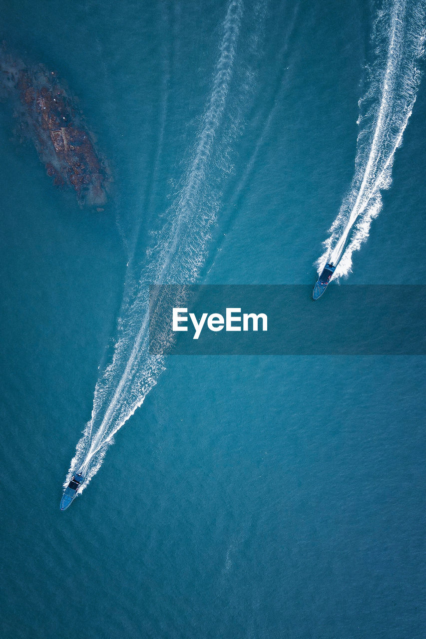 Aerial view of sailboat in sea