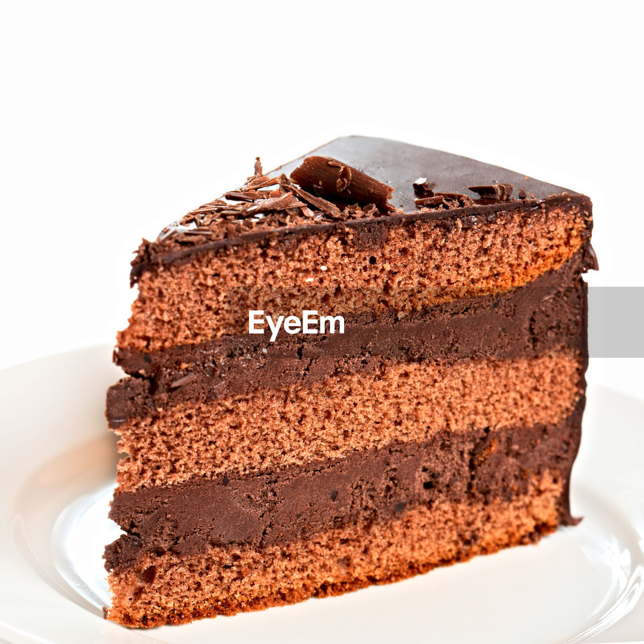 CLOSE-UP OF CHOCOLATE CAKE IN CONTAINER