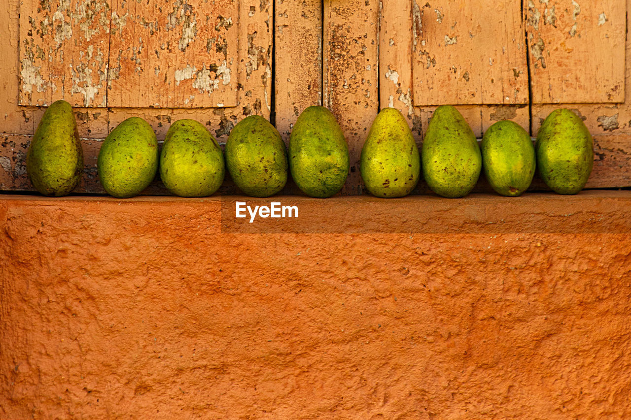 Lined mangos placed in a window ii , trinidad - cuba