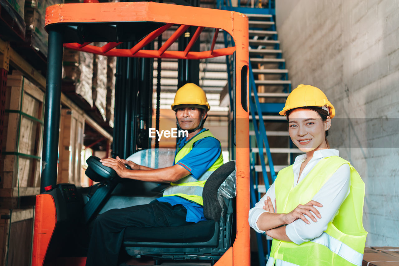 Portrait of worker and engineer at factory