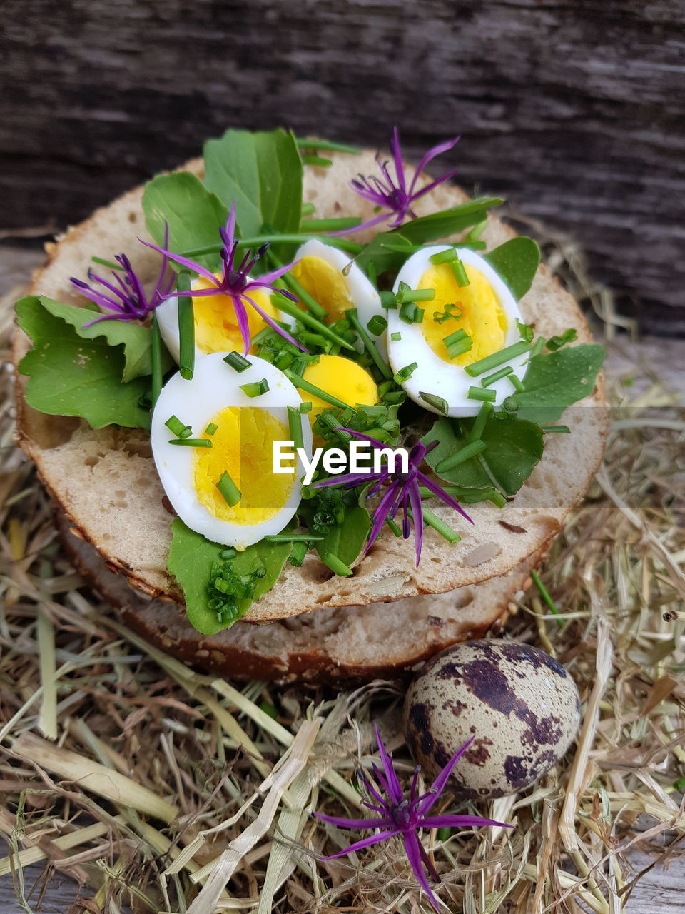 egg, food, flower, plant, food and drink, freshness, healthy eating, wood, high angle view, no people, egg yolk, nature, floristry, flowering plant, wellbeing, directly above, close-up, vegetable, easter egg, animal egg, easter, plant part, eggshell, leaf, produce, outdoors, animal nest