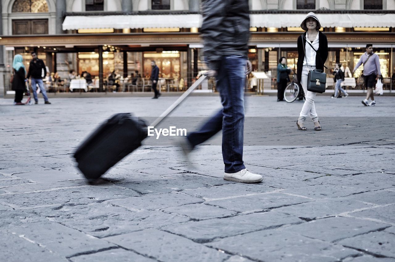 WOMAN WALKING ON STREET