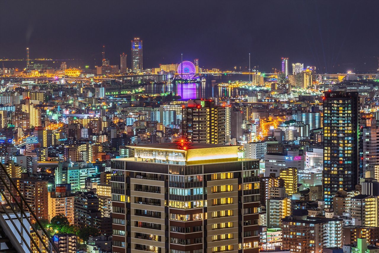 High angle view of illuminated city at night