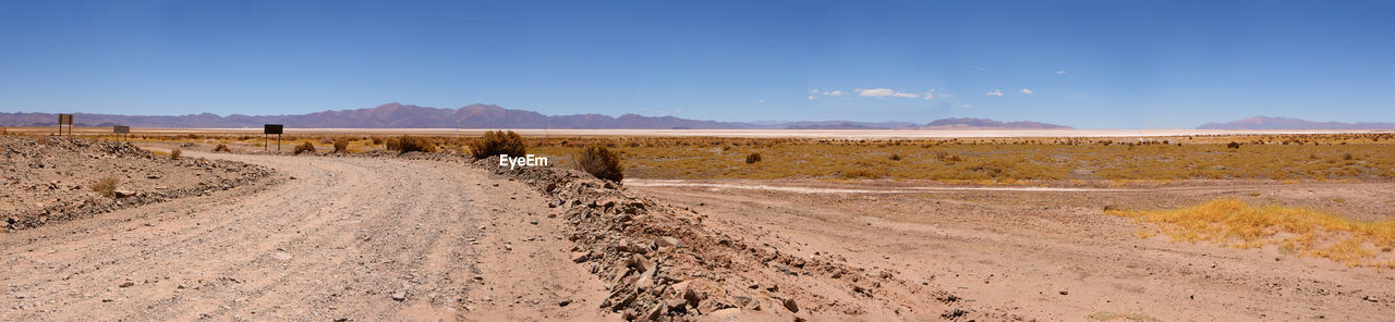 Scenic view of desert against clear sky