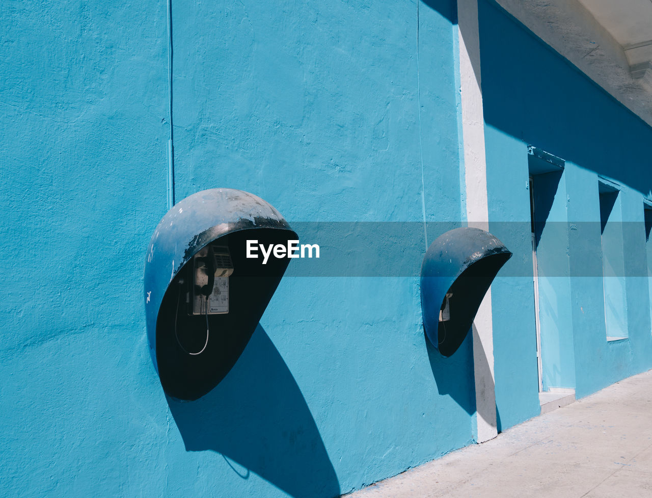 CLOSE-UP OF BLUE METAL WALL