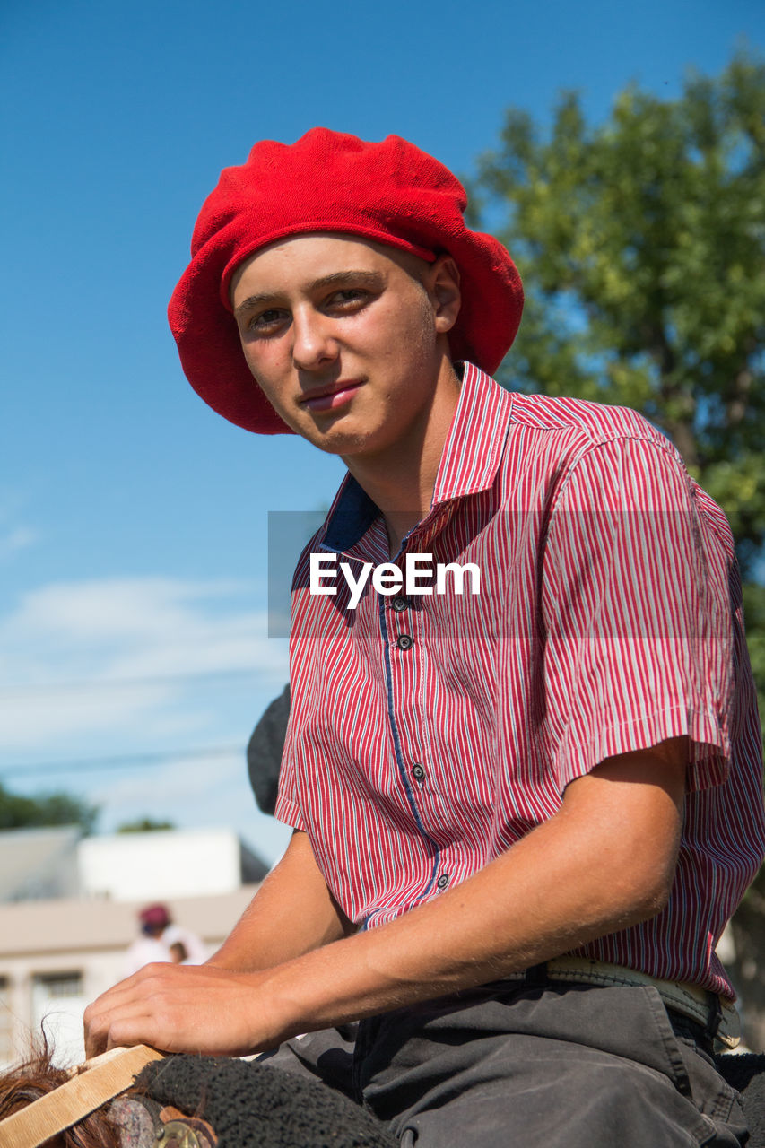 Young man wearing traditional clothing