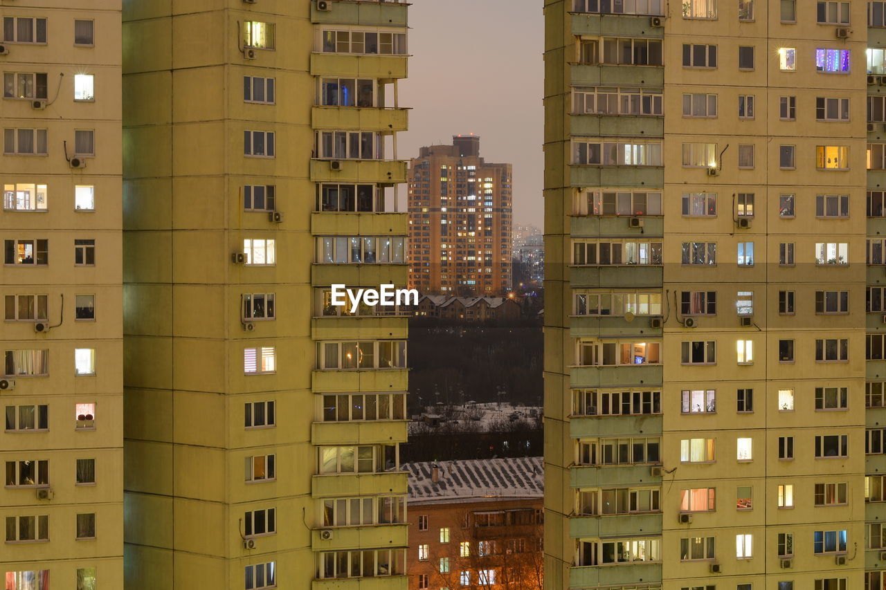 Buildings in city at night