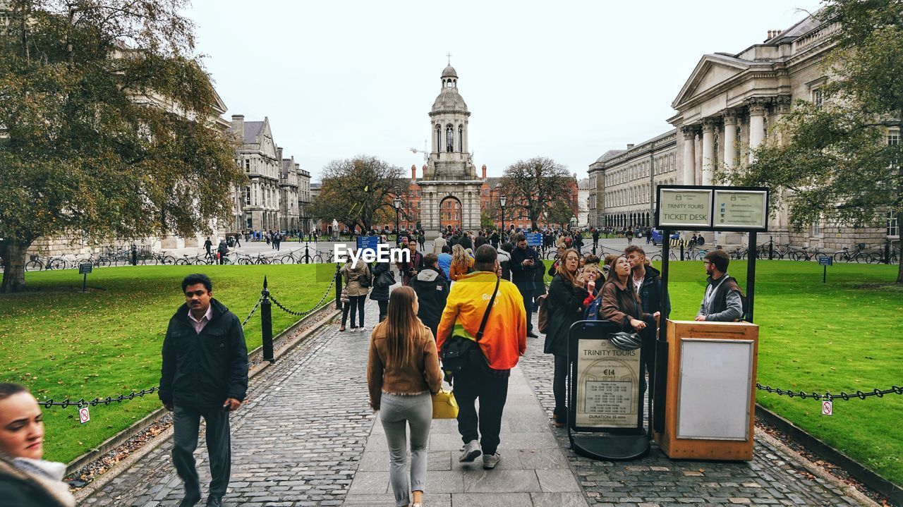 PEOPLE WALKING ON A STREET