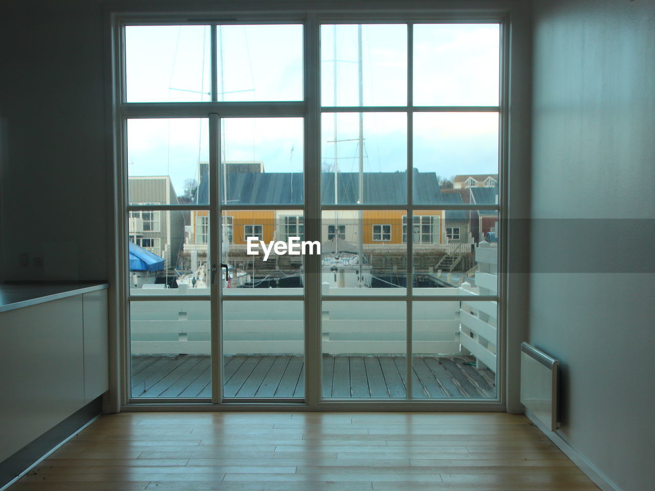 BUILDINGS SEEN THROUGH WINDOW