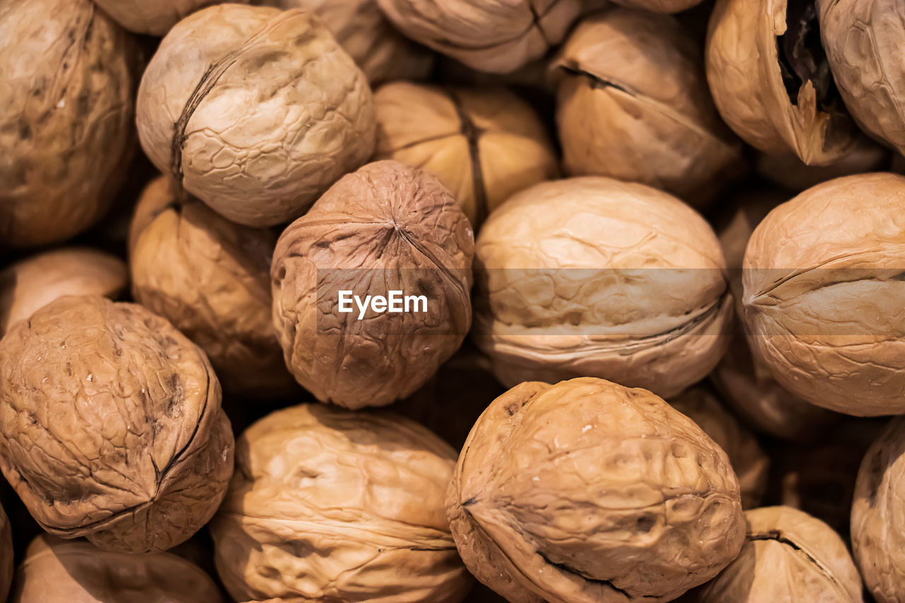 Background from walnuts closeup. healthy protein source